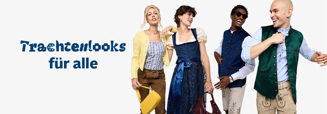 Trachtenlooks für alle – vier Personen in moderner Tracht lachen und posieren nebeneinander