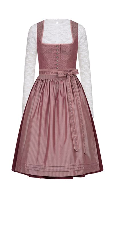 Bordeauxrotes Dirndl mit weißer, langärmeliger Bluse