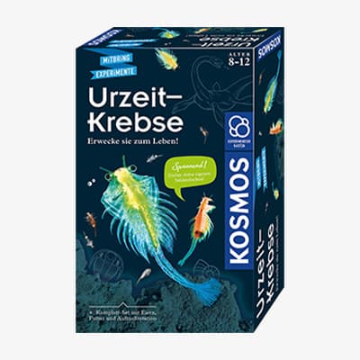 Urzeit-Krebse – Experimentierkasten für Kinder ab 8 Jahren mit Bild von bunten Urzeitkrebsen vor schwarzem Hintergrund