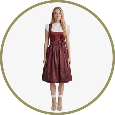 Bordeauxrotes Dirndl mit breiten Trägern, Knopfleiste vorn und passender Schürze mit seitlich gebundenem Band
