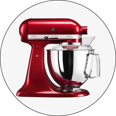 Rote Küchenmaschine mit Edelstahl-Rührschüssel und Bedienelementen auf der Seite