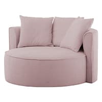 Runder, rosafarbener Sessel mit drei passenden Kissen.
