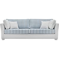 Blau-weiß gestreiftes Sofa mit weißen Kissen