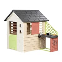 Spielhaus für Kinder mit grüner Tür, schwarzem Dach und Außenküche.