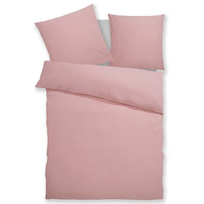 Rosa Bettwäsche-Set bestehend aus zwei Kissenbezügen und einem Bettdeckenbezug.