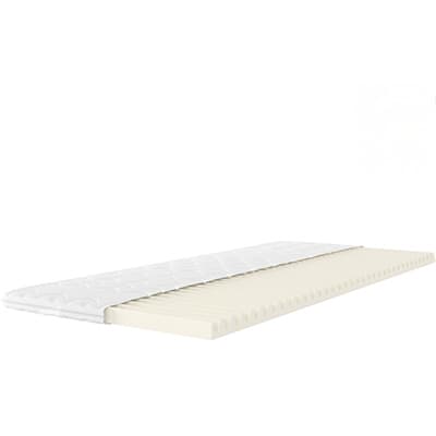 Matratzenauflage mit weißem Bezug und wellenförmiger Unterseite, seitlich aufgenommen