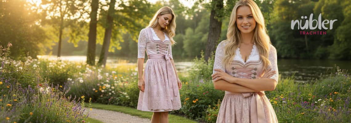 Frau im rosafarbenen Dirndl steht lächelnd am blühenden Seeufer, nübler Trachten Logo oben rechts